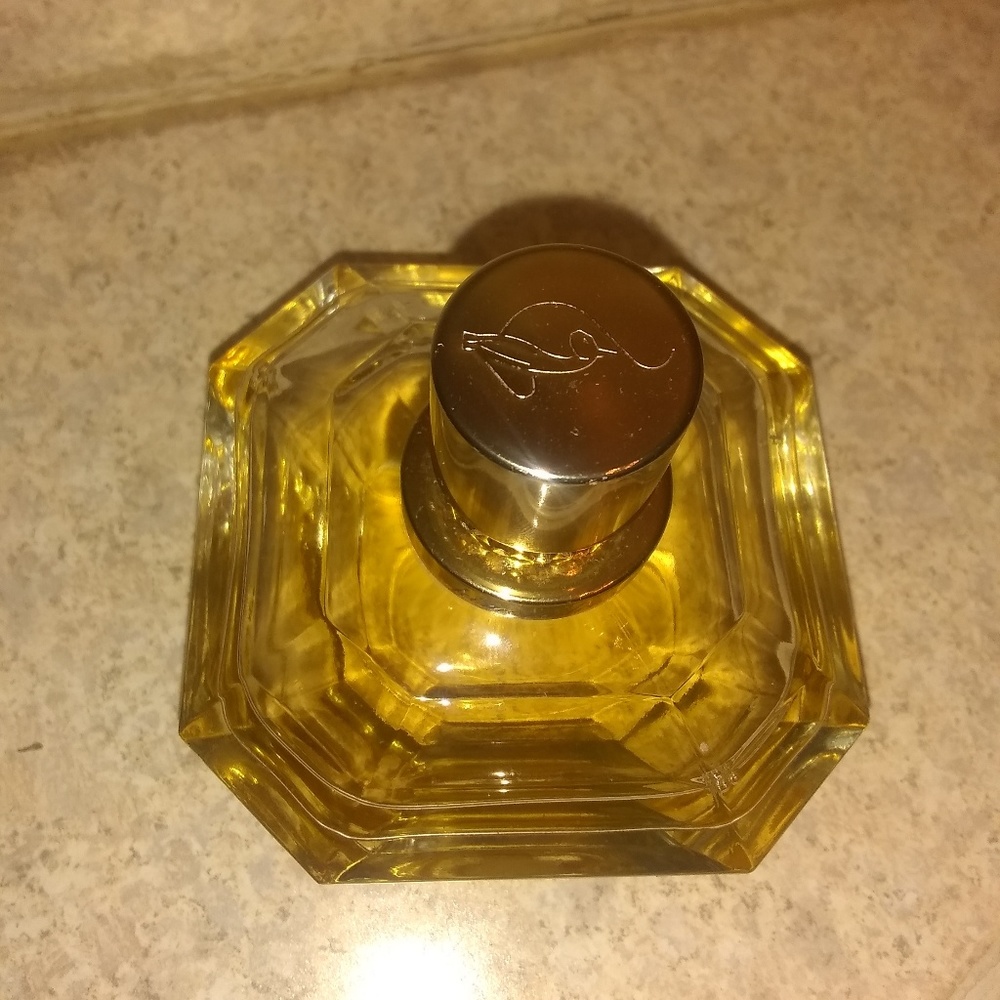 SOLD****Golden goddess by baby phat